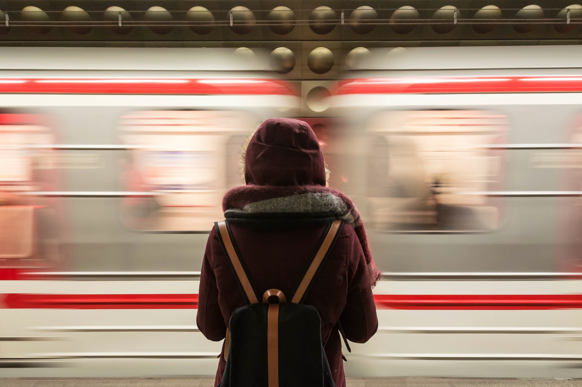 A teenager girl was stabbed on a train after ignoring a man who asked her the time